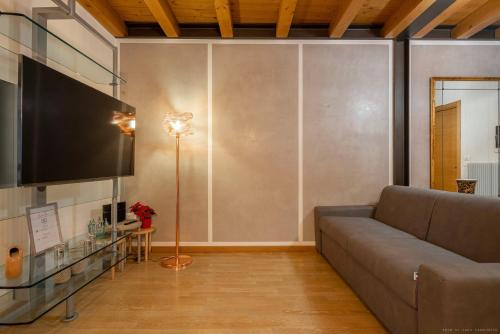 Televisyen dan/atau pusat hiburan di [Venezia-Suite Hemingway]a pochi passi Outlet