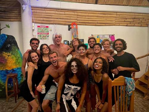 a group of people posing for a picture at Huitzilin Hostal in Brisas de Zicatela