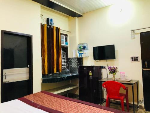 Μια τηλεόραση ή/και κέντρο ψυχαγωγίας στο HOTEL TIP TOP -- LPU Law Gate -- Family, Students, Couples