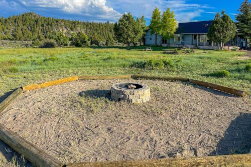 an outdoor fire pit in the middle of a field at Fish Hatchery Ranch in Hatch
