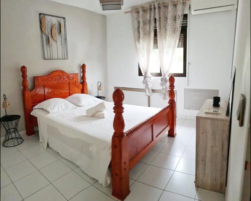 Postel nebo postele na pokoji v ubytování Appartement cosy dans résidence avec piscine