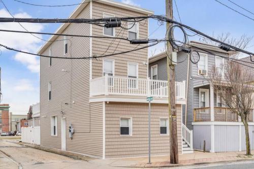 a large house on a street with at Next to Convention Center, Dave and Busters and Shops with parking in Atlantic City