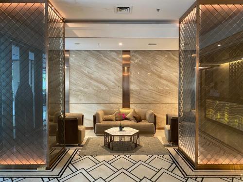 The lobby or reception area at Pollux High Rise Apartments at Batam Center with Netflix by MESA