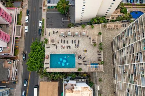 an aerial view of a building with a swimming pool at Island Colony 3519 - 30 night minimum in Honolulu