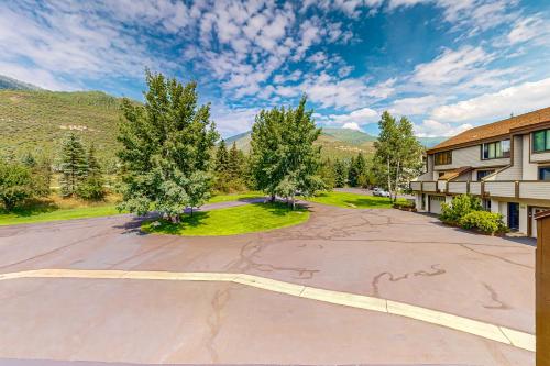 an empty parking lot in front of a building at Spruce Creekside in Vail