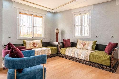 Posezení v ubytování Villa avec vue sur mer