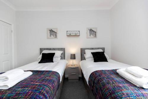 NormanbyにあるThe Normanby!の寝室に並んで置かれた2つのベッド