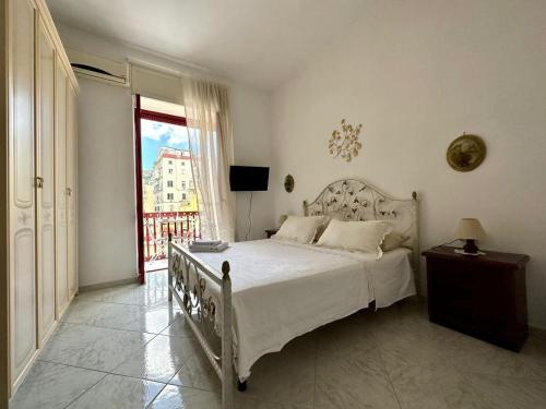 Ένα ή περισσότερα κρεβάτια σε δωμάτιο στο Family Relax Caracciolo
