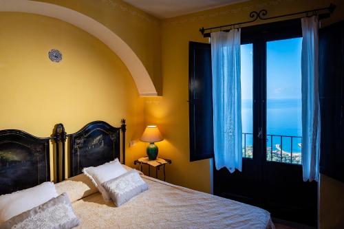 Ένα ή περισσότερα κρεβάτια σε δωμάτιο στο Marulivo Hotel