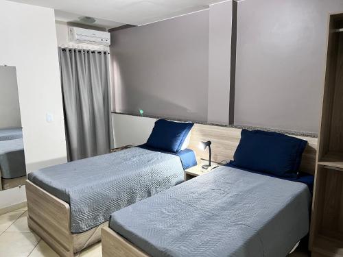 Postel nebo postele na pokoji v ubytování Hotel Golden JK