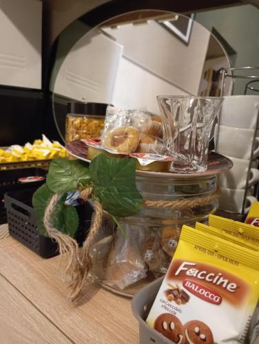 a counter with a bunch of food on a table at Terrazza Filangiò in Caserta