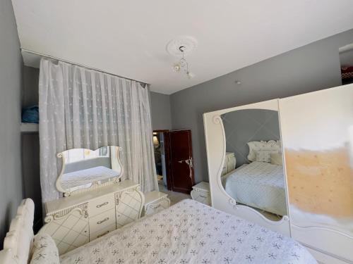 Postel nebo postele na pokoji v ubytování Deluxe House