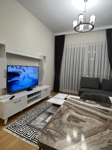 TV a/nebo společenská místnost v ubytování Luxury Apartment 1+1 With Pool SPA