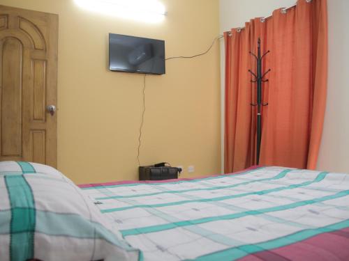 Televisor o centre d'entreteniment de Golpata Bed & Breakfast