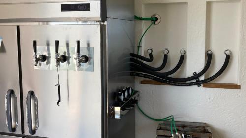 a refrigerator in a kitchen with at ZARATAN in Motobu