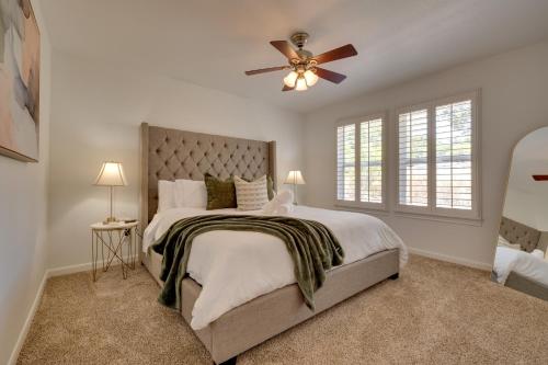 A bed or beds in a room at 1-Story Hill Country Home Near Fiesta with Pool!