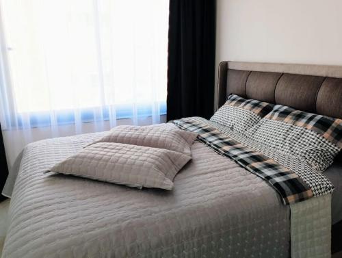 Postel nebo postele na pokoji v ubytování Antares hill 16