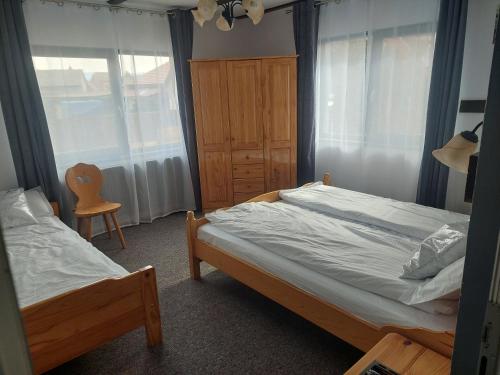 Postel nebo postele na pokoji v ubytování Morrison Apartments
