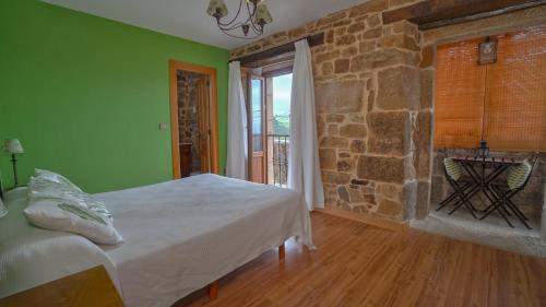 Katil atau katil-katil dalam bilik di Posada Venta Hornizo