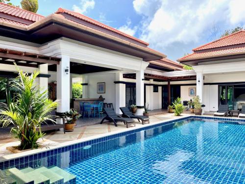 an image of a villa with a swimming pool at Siam Jewel - Private pool villa in Bang Tao in Bang Tao Beach