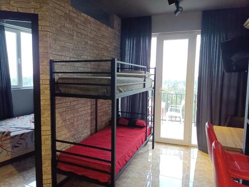 Postel nebo postele na pokoji v ubytování Crimson Serenity Appartment