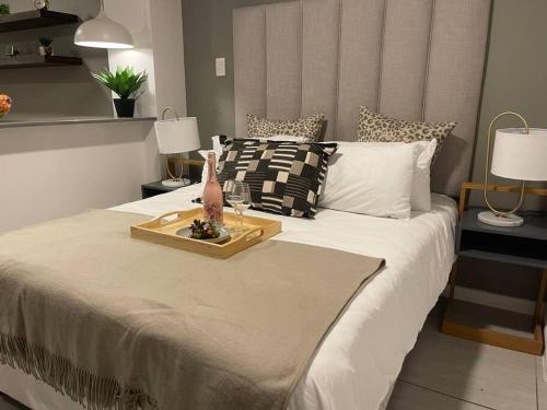 Postel nebo postele na pokoji v ubytování Luxury Beach Getaway@Coral Point