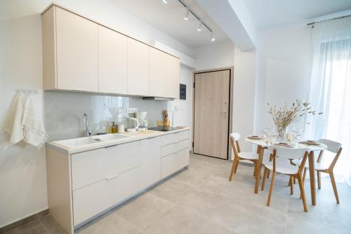 Kuchyň nebo kuchyňský kout v ubytování Maison Poème - Luxury Apartments