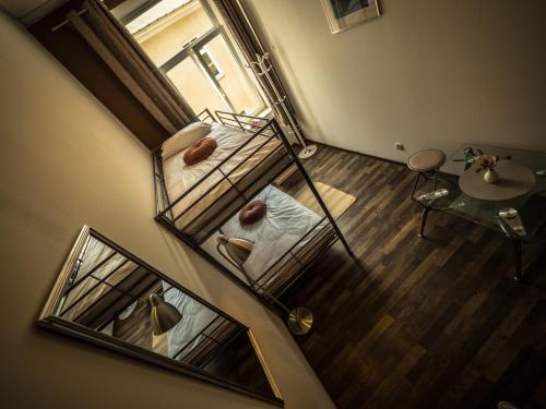 an overhead view of a room with a mirror at Hostel Pod Basztą in Lublin