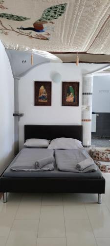 Cama o camas de una habitación en Geinberg Suites & Via Nova Lodges