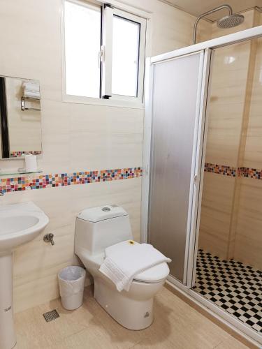 Un baño de Mrs Payrang 自助入住 self check in