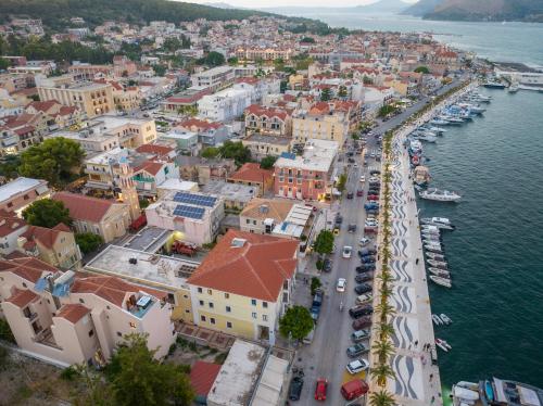an aerial view of a town next to the water at Pink Panther Maisonette Suite in Argostoli
