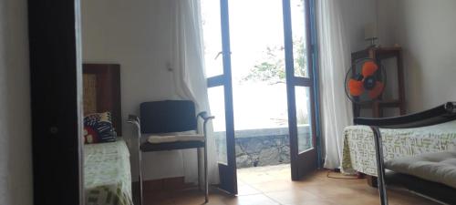 TV a/nebo společenská místnost v ubytování Casa Praia Tarrafal de Monte Trigo