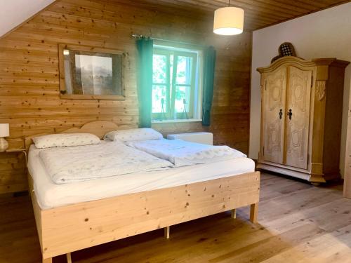 Postel nebo postele na pokoji v ubytování Haus Zirbennest