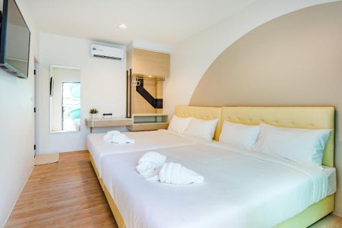 Postel nebo postele na pokoji v ubytování Ban Ruer-Au Pool Villa