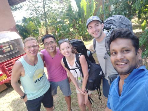 a group of people posing for a picture at Lake Cabin in Polonnaruwa