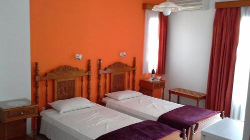 Cama o camas de una habitación en Hotel Agnanti