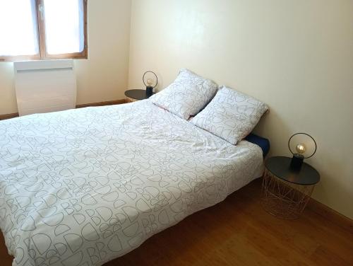 Postel nebo postele na pokoji v ubytování Chez Fanfan