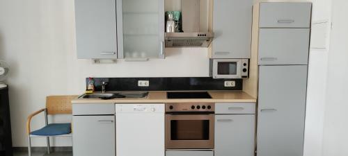 Una cocina o zona de cocina en Geinberg Suites & Via Nova Lodges