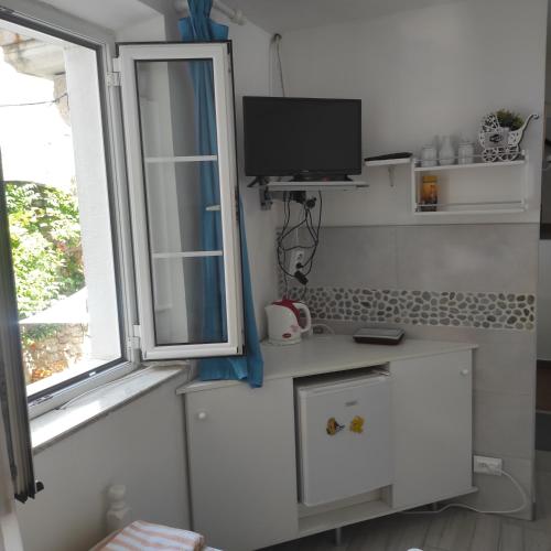Una cocina o zona de cocina en Guesthouse Bogdanovic