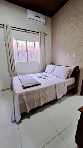 Ένα ή περισσότερα κρεβάτια σε δωμάτιο στο Casa Acerola - Vila de São Jorge