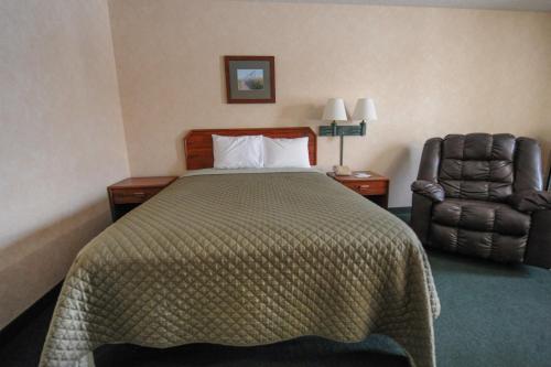 Postel nebo postele na pokoji v ubytování Hotel Yuma