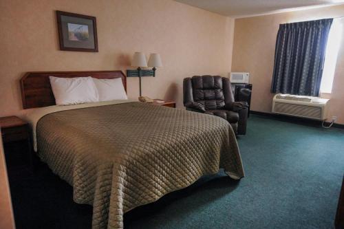 Postel nebo postele na pokoji v ubytování Hotel Yuma