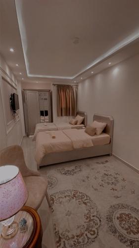 Ένα ή περισσότερα κρεβάτια σε δωμάτιο στο El Mansour Hotel Apartmen 92