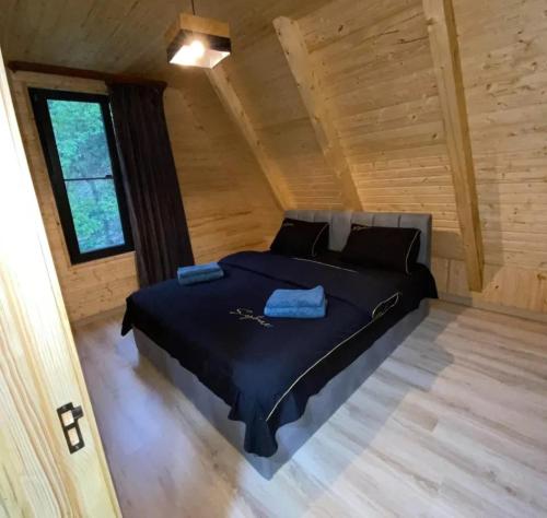 Кровать или кровати в номере Cozy Cottage Dilijan Arg