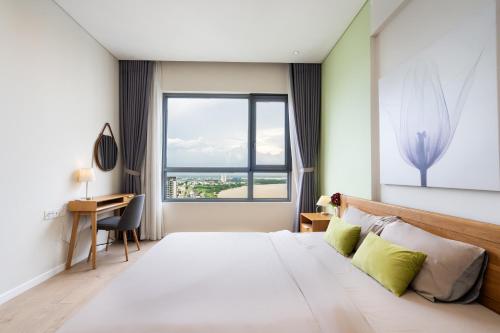 Postel nebo postele na pokoji v ubytování Diamond Island Highfloor RiverView 8min to D1