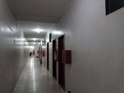 a hallway in a building with at Hotel Canal Hum in Brasilia