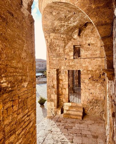 an old stone building with a window in it at La casa del Borgo Anagni in Anagni