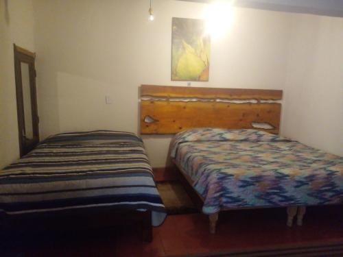 Postel nebo postele na pokoji v ubytování Casa xocolatl