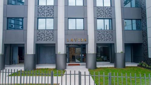 a building with a sign that reads laxida at LAVIDA in Abidjan