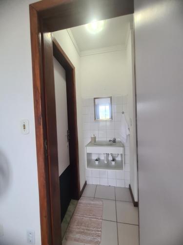 Ένα μπάνιο στο Apartamento aconchegante